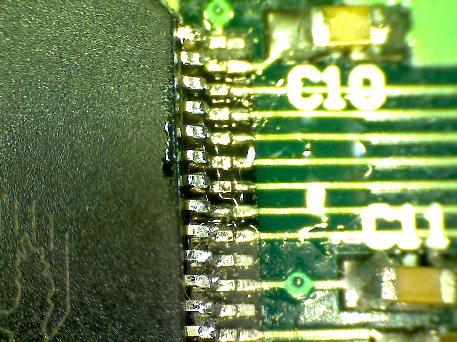 Flux residue ontop of some microcontroller pins.