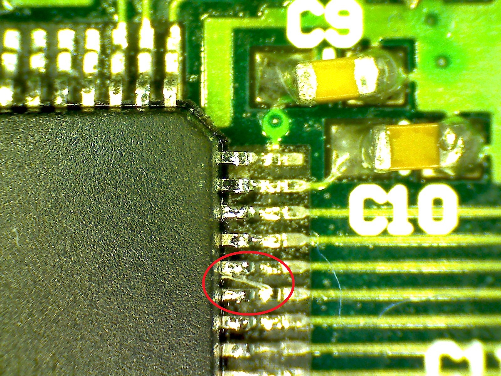 Flux residue ontop of some microcontroller pins.