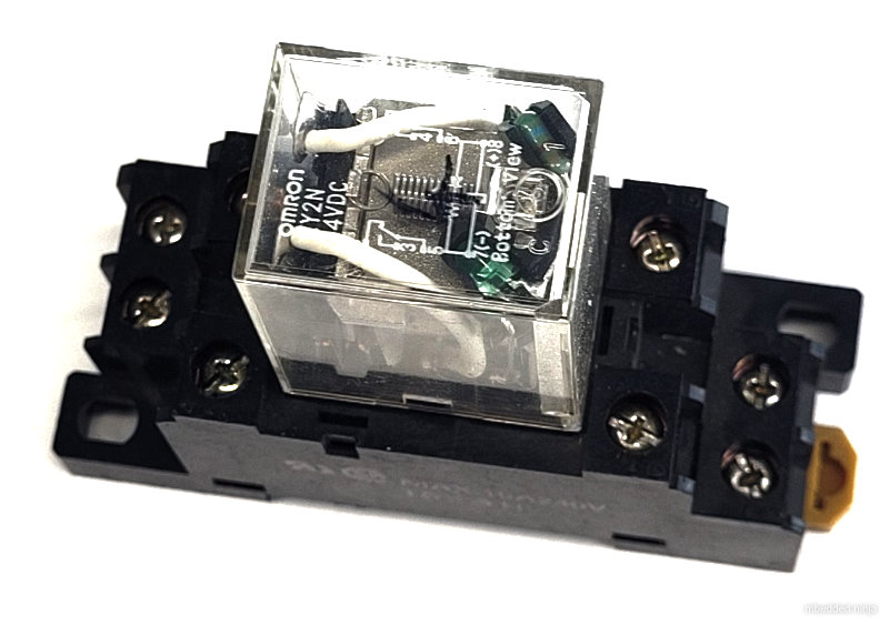 An Omron relay on a DIN mounted relay "socket".