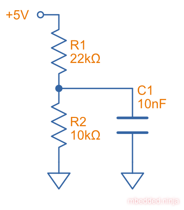 Schematic of a capacitor being charged through a resistor divider. How long will it take to charge?