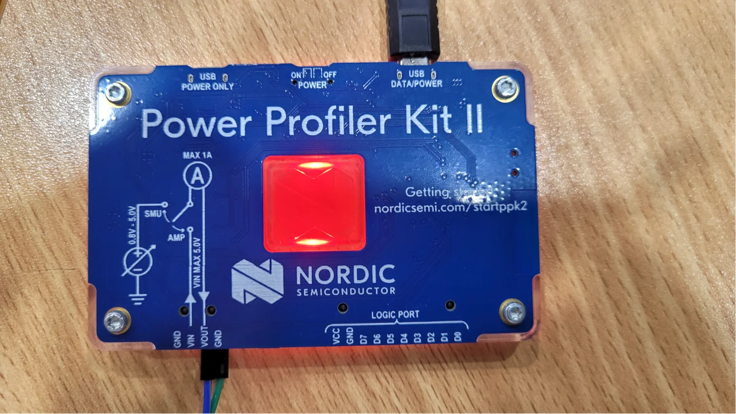 A photo of the Nordic Power Profiler Kit 2 when measuring the power to a low-power embedded circuit (off the bottom of screen, not visible).