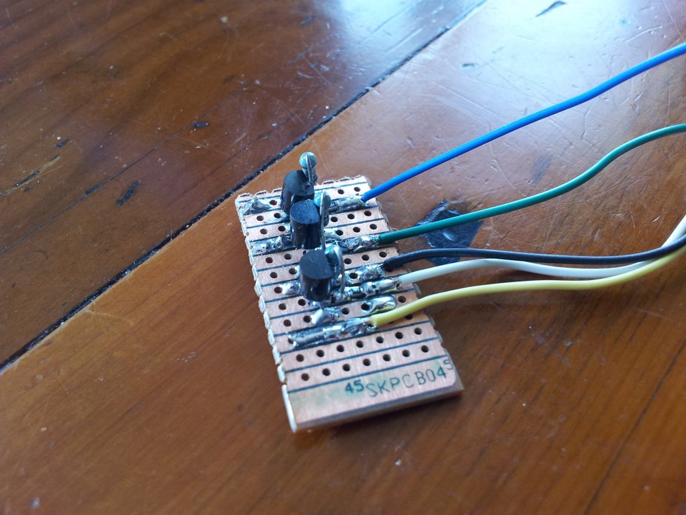 The daughter board for the Arduino to switch on the three lights.