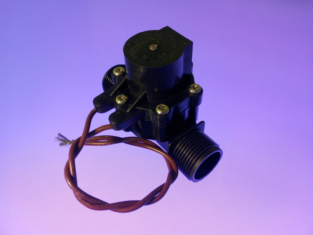 A 12V solenoid valve. 62 of these were used to control the flow of UV-reactive tonic water or air through the pipes.