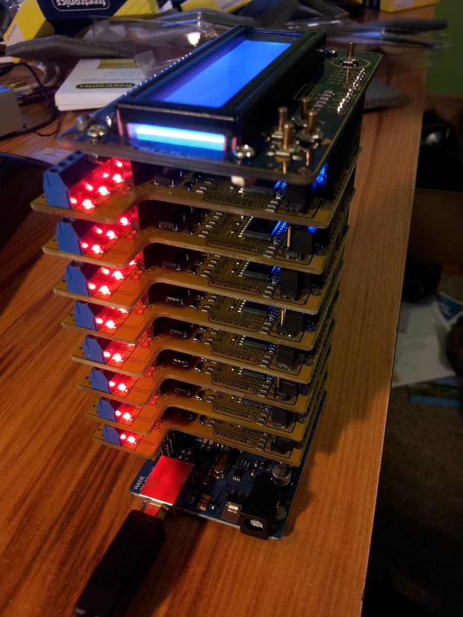 A Ardunio stack with the Uno (at bottom), 8 relay shields, and an LCD shield on-top.