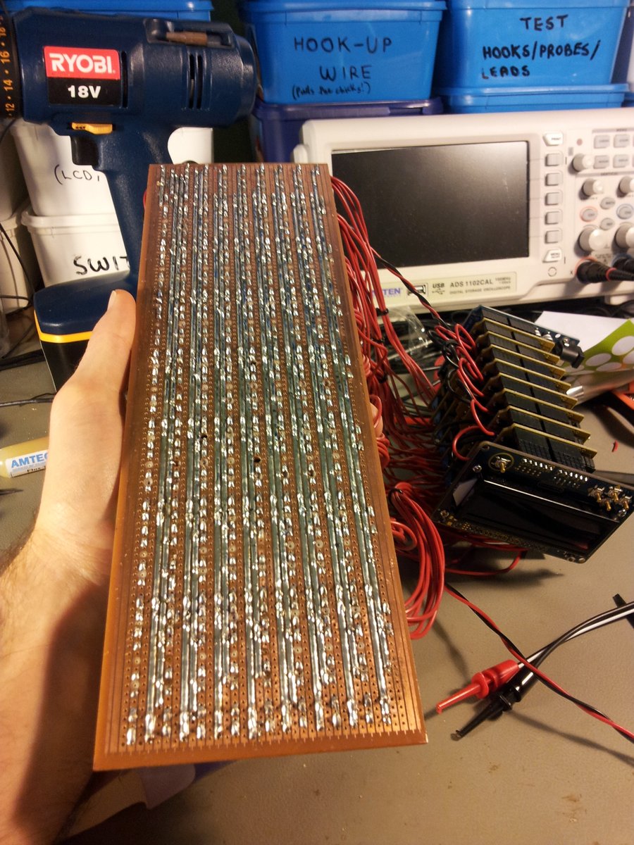 The bottom-side of the prototype board, fully soldered. Notice the heavy duty rails that deliver the power to the relays/solenoids. Even with these thick lines of solder, when half (31) of the solenoids where turned on, the board got considerably warm around the PSU entry point.