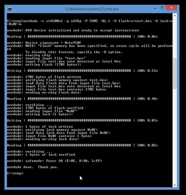 A Windows command-line screenshot of AVRDUDE programming an Atmel ATmega microcontroller.