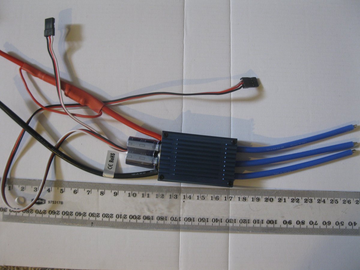 A size comparison of the BLDC ESC (electronic speed controller).