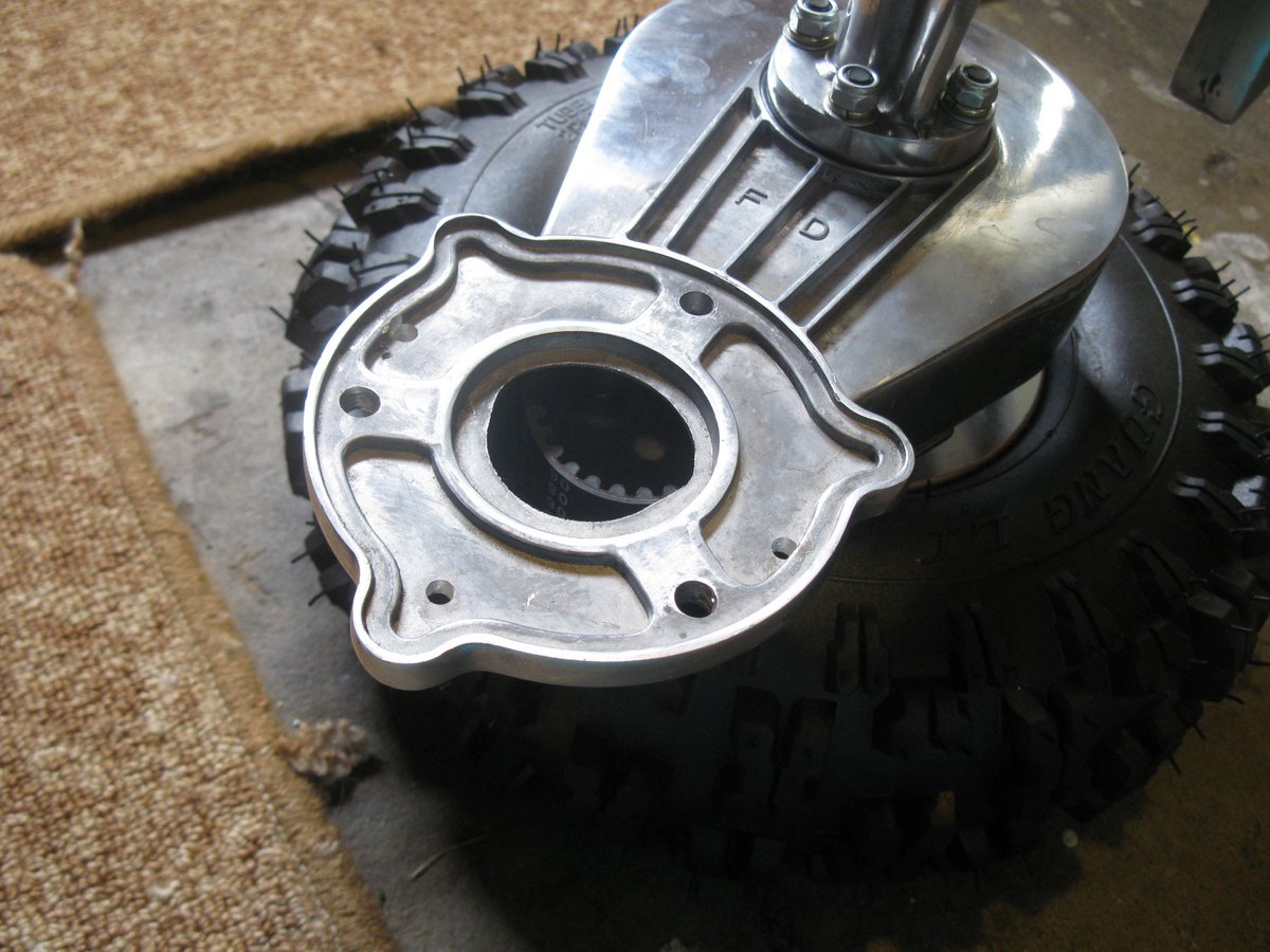 The wheel motor mount, next to one of the back wheels.