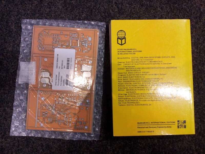 This photo shows the gross orange colour of the electric skateboard PCBs compared to the kind of yellow I was expecting.