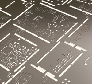 An example of a stainless steel soldermask stencil. Image from http://www.soldermask.com/.